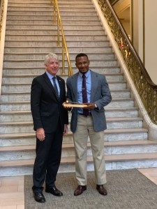 Associate Dustin T. Narcisse receiving the Legal Food Frenzy Award